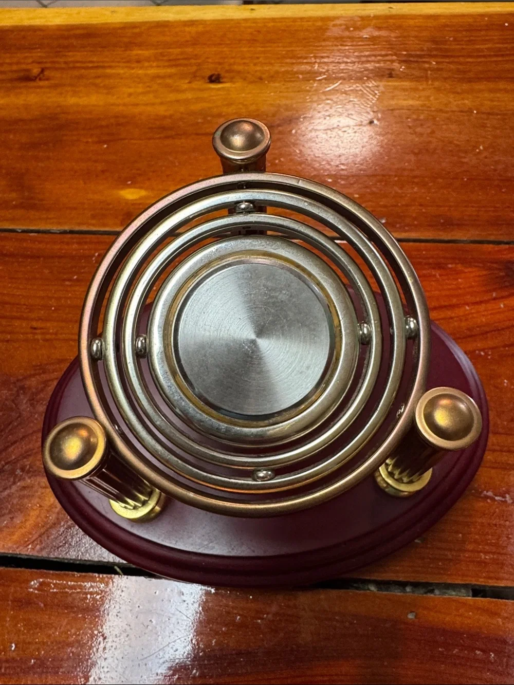 Gyroscopic Desk Clock 2 Toned Metalwork World Map Face. Needs battery
